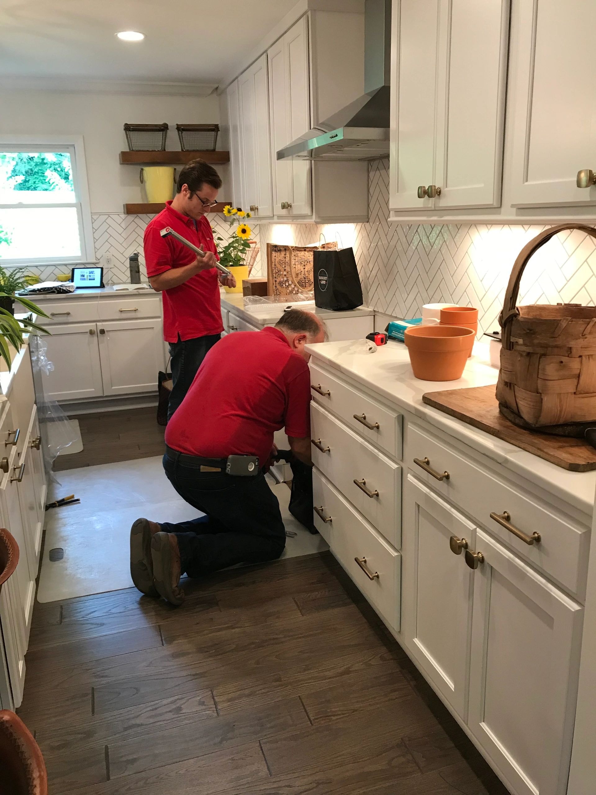 HomeWorks team working on a kitchen installation